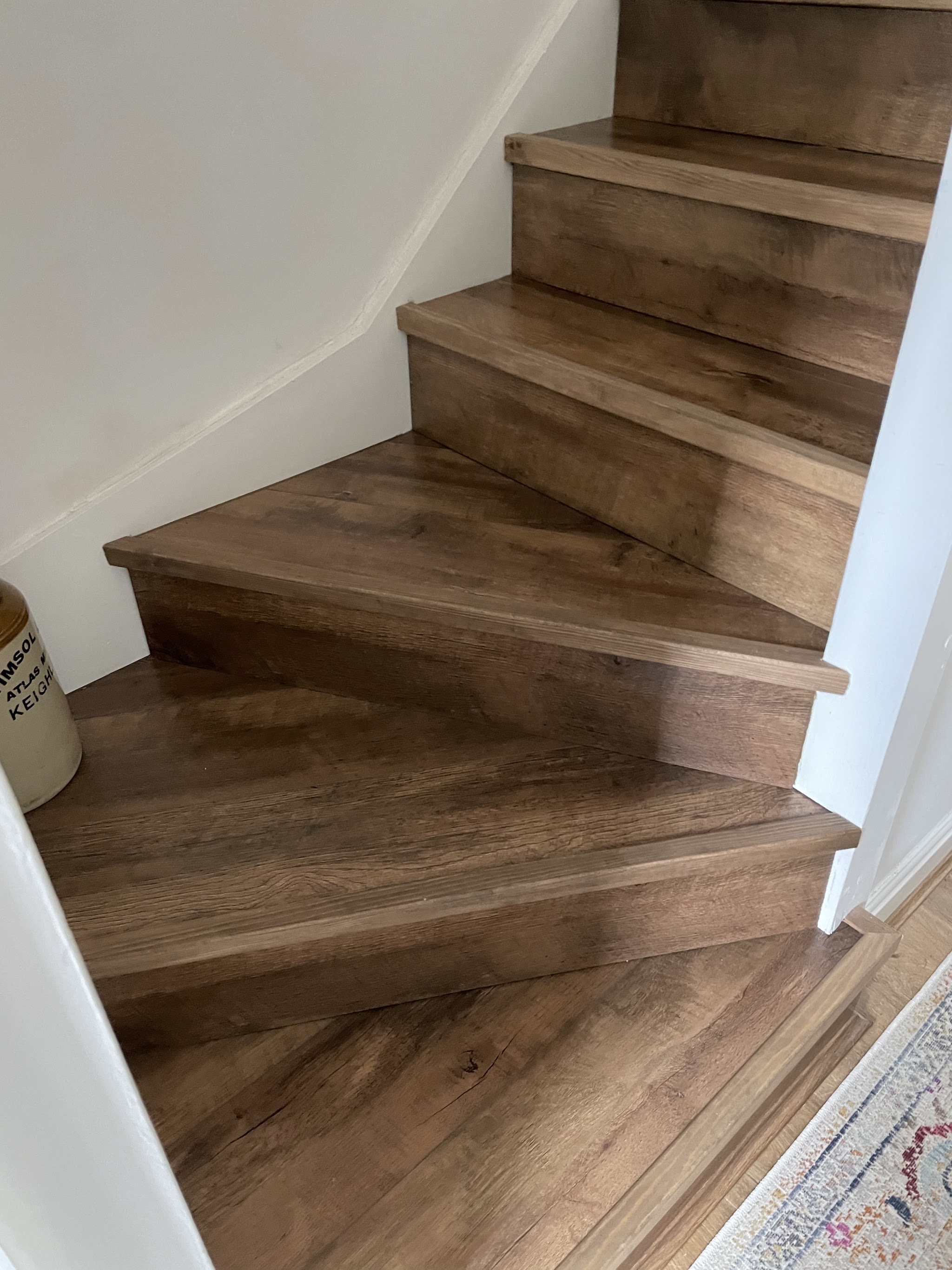 Carefully fitted wood-look flooring on a staircase